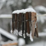 clothesline in the winter with snow on it