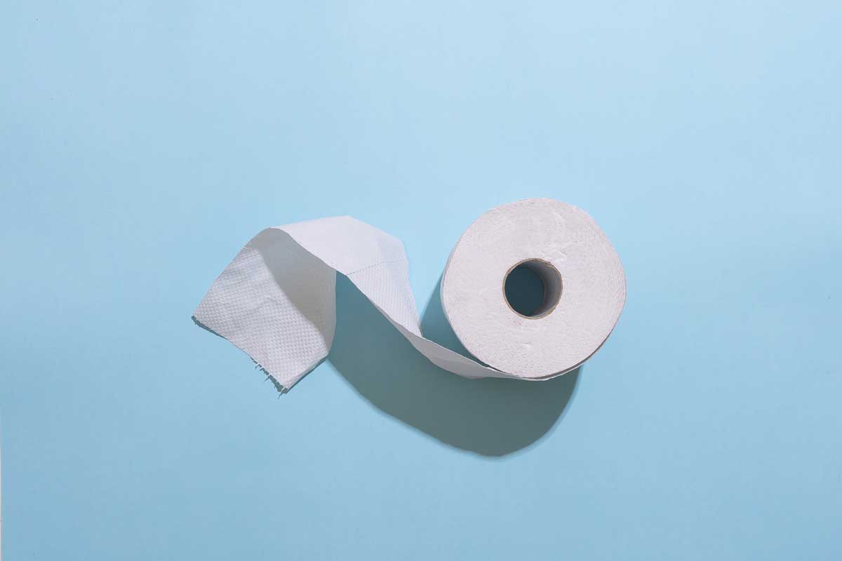 toilet paper on a light blue background