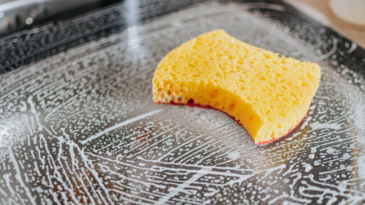 sponges being used for cleaning